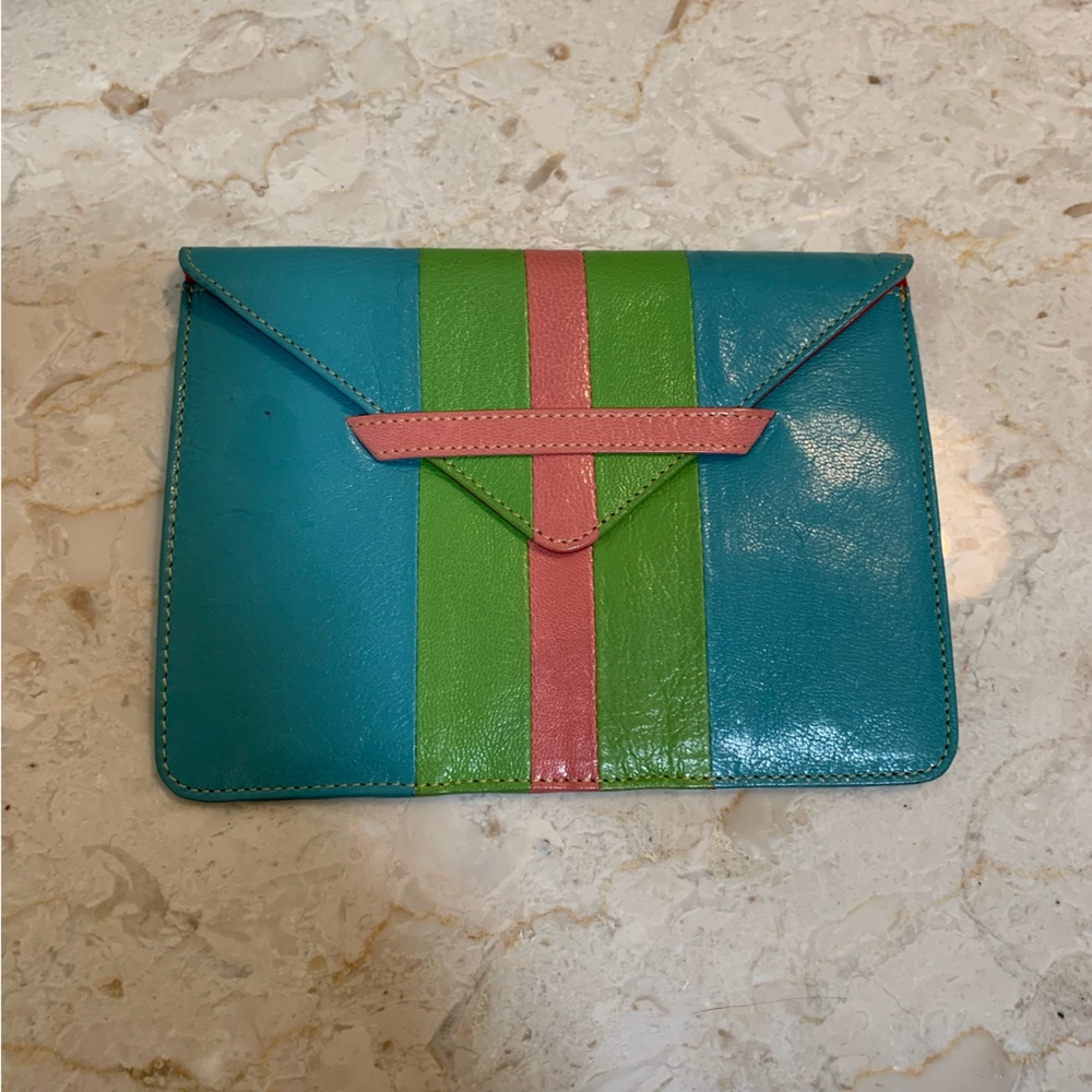 Tusk  leather. Small clutch or photo case  great condition